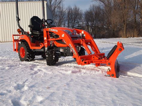 kubota skid steer trenching pictures|kubota snow pusher attachment.